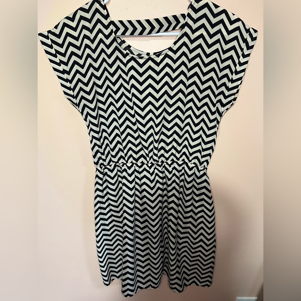 Cream and black color dress soft fabric